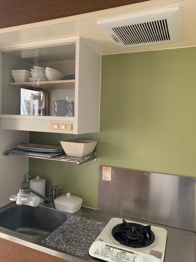 Appartement ウィンベル沖縄名護コーラルビュー à Agarii Extérieur photo