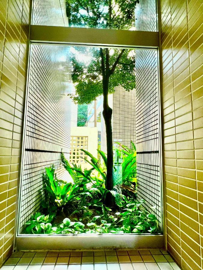 Appartement ウィンベル沖縄名護コーラルビュー à Agarii Extérieur photo