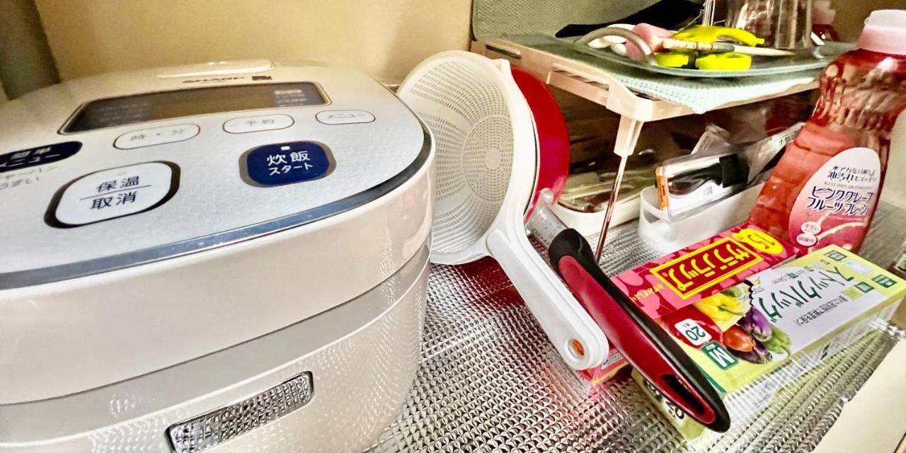 Appartement ウィンベル沖縄名護コーラルビュー à Agarii Extérieur photo